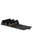 Dagne Dover Remi foldable glasses holder in black, unfolded and containing sunglasses.