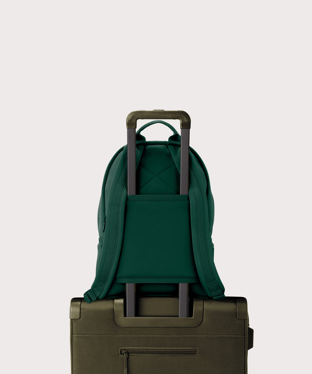 Medium Dakota in a saturated, jewel-toned deep green with bold blue undertones. displaying luggage sleeve