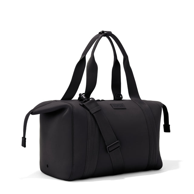 Large Landon Carryall in black with zippers unbuckled