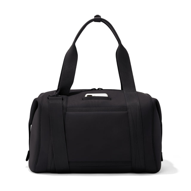 Large Landon Carryall in black, displaying an exterior phone pocket