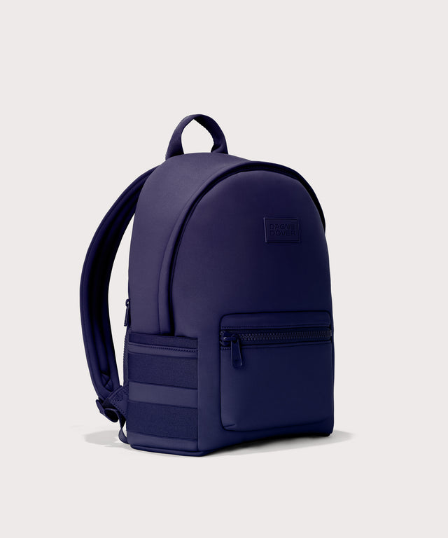 Large Dakota in a jewel-toned, deep blue with strong purple undertones., side angle view