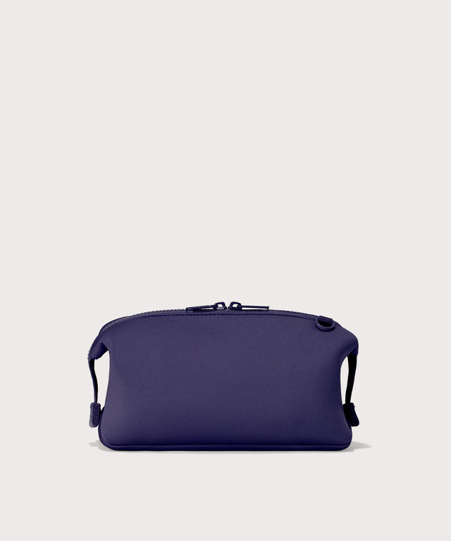 Hunter Large toiletry bag in  a jewel-toned, deep blue with strong purple undertones Back view.