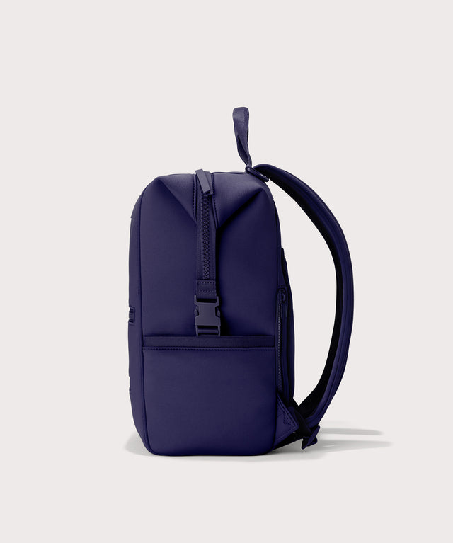 Large Indi backpack in a jewel-toned, deep blue with strong purple undertones., side view