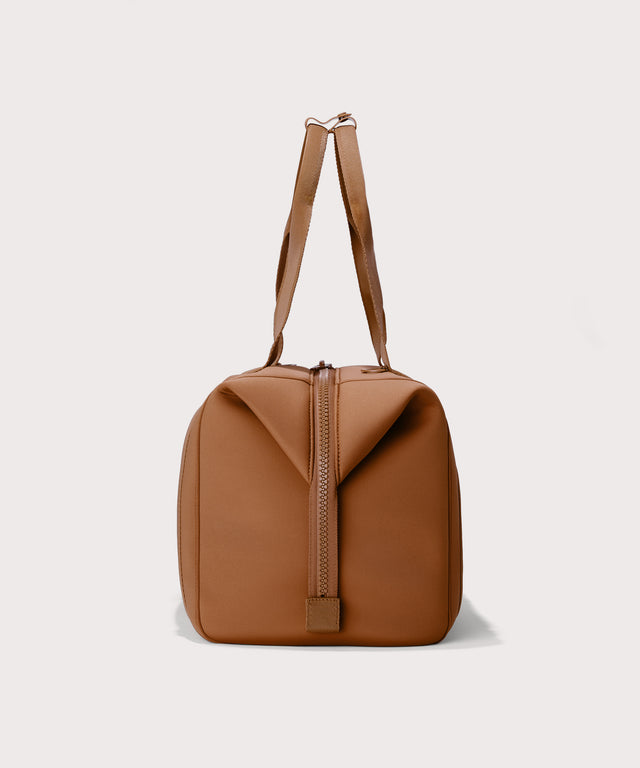 Large Landon Carryall in a a saturated, warm medium-brown with burnt orange undertones, side view