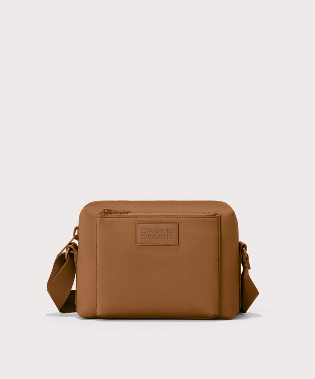 Micah crossbody bag in a saturated, warm medium-brown with burnt orange undertones