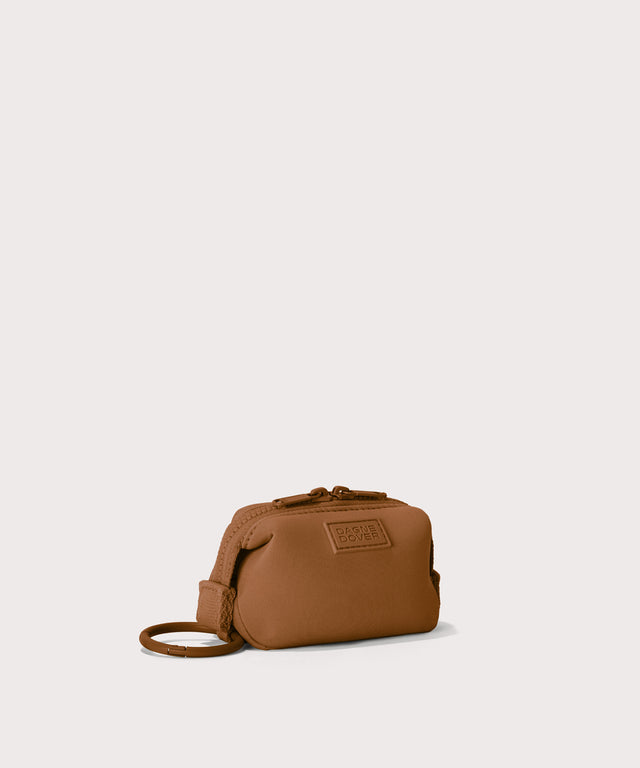 Hunter keychain in a saturated, warm medium-brown with burnt orange undertones side angle view