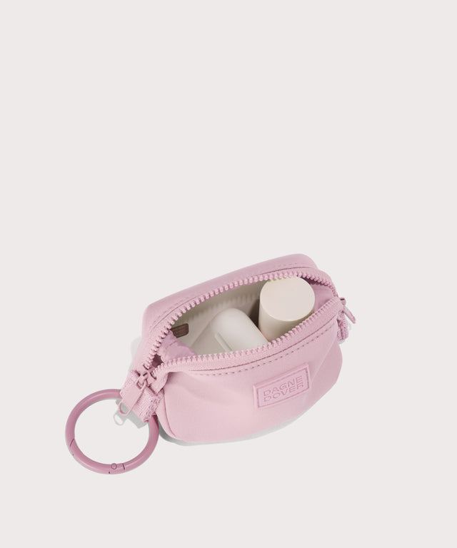 Hunter keychain in a cool, powdery pink with soft grey undertones. . unzipped, top down view.