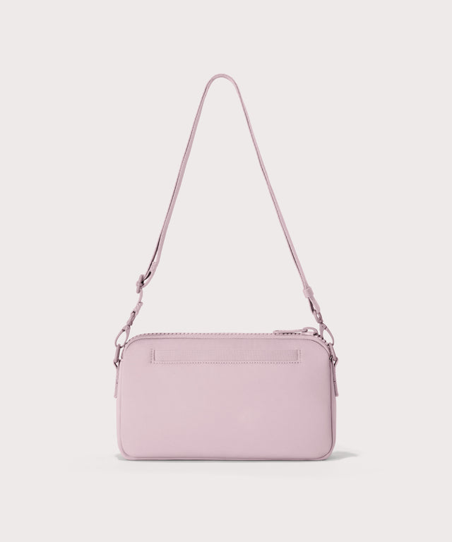 Nora shoulder bag in a cool, powdery pink with soft grey undertones. Back view.
