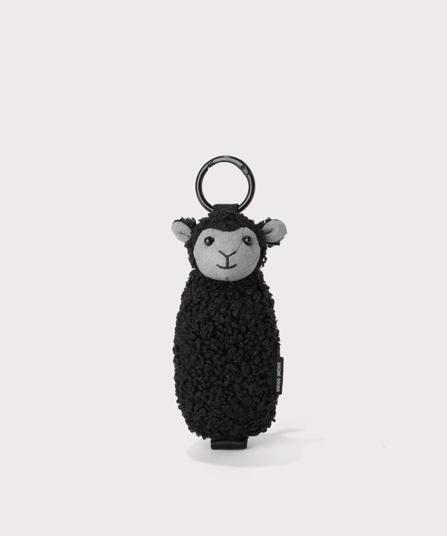Black sheep keychain in a black In a  Faux Shearling  a soft, wool-like plush made with recycled materials