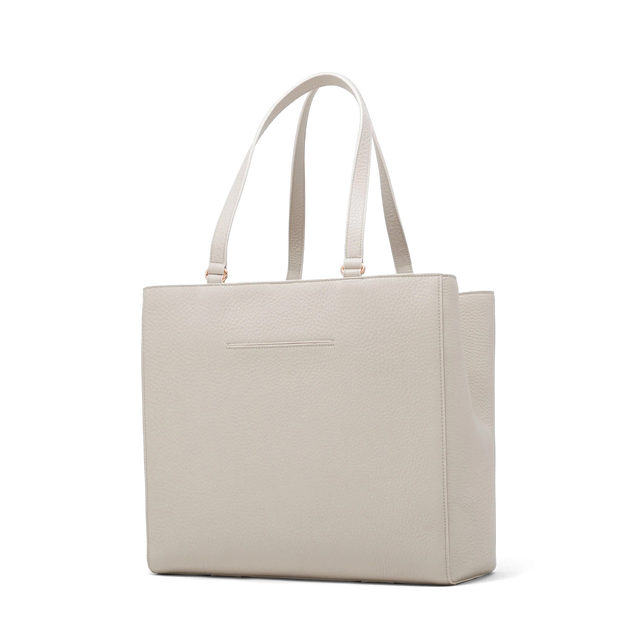 Dagne Dover large Allyn Tote in grey with the exterior slip pocket.