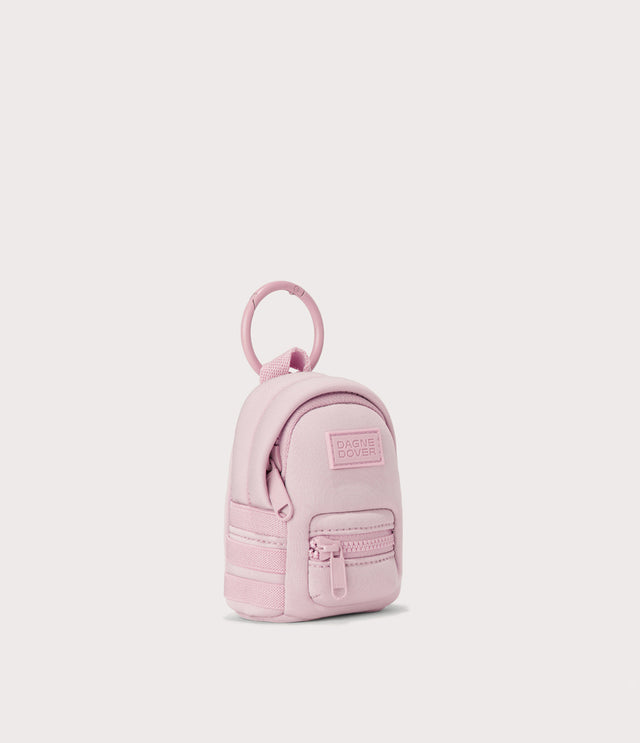 Dakota keychain in a cool, powdery pink with soft grey undertones. side angle view