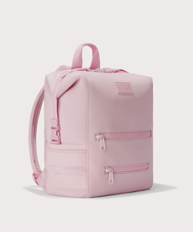 Large Indi backpack in a cool, powdery pink with soft grey undertones, side angle view