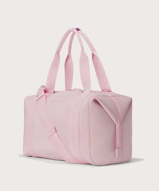 Large Landon Carryall in a cool, powdery pink with soft grey undertones, side angle view