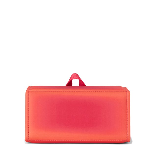 Dagne Dover Remi foldable glasses holder in dark a sun-bleached novelty treatment with fruit punch and pops of airbrushed orange seen from the back.