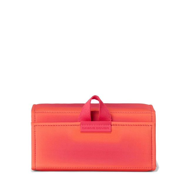 Dagne Dover Remi foldable glasses holder in a sun-bleached novelty treatment with fruit punch and pops of airbrushed orange.