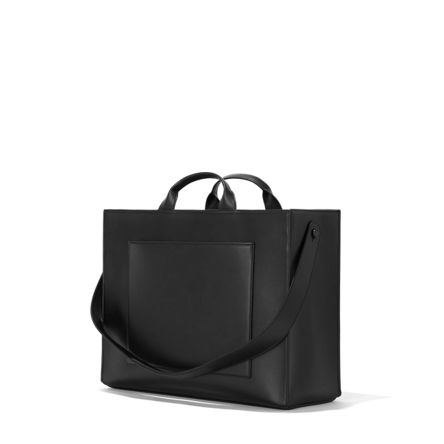 Dagne Dover large vegan Daily Tote in black seen from an angle.