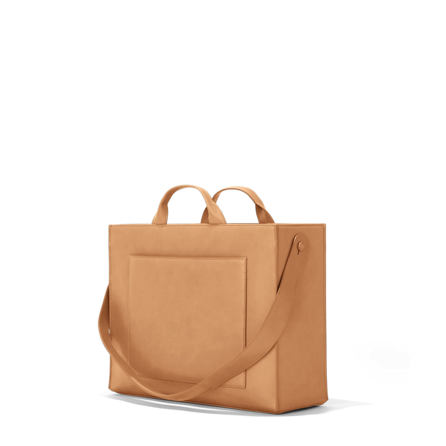 Dagne Dover medium vegan Daily Tote in brown seen from an angle.