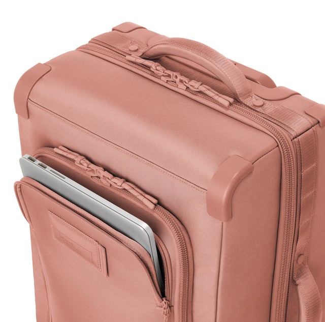 Caption: Front pocket fits most 15” laptops
