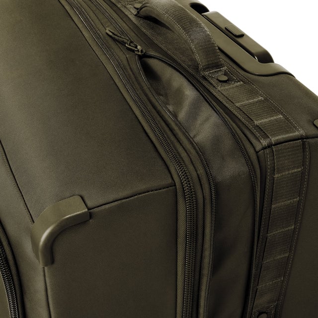 Detail shot of Sydney checked rolling luggage 28.5” in dark moss expandable zipper feature