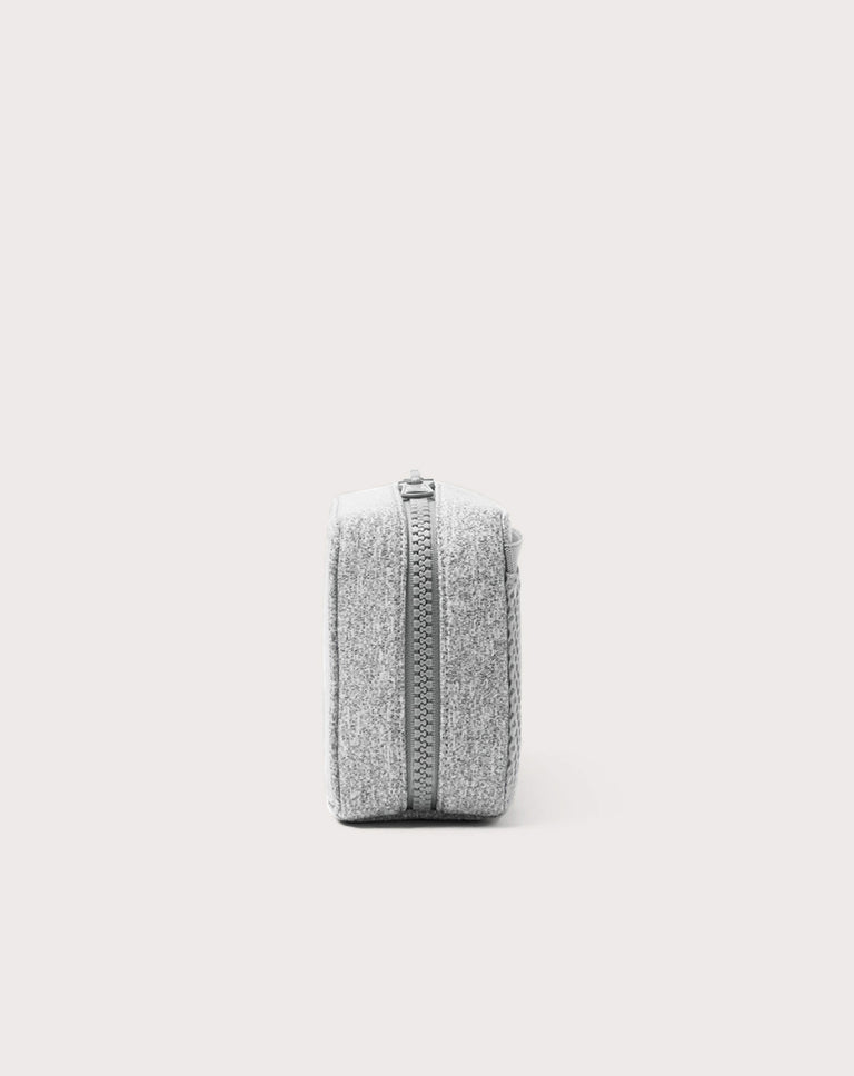 Dagne Dover large Arlo Tech Organizer in grey seen from the side.