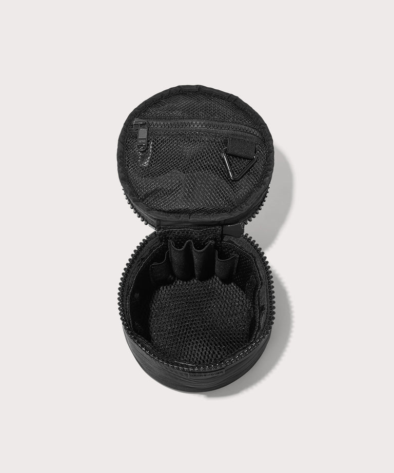 Dagne Dover small Mila Toiletry Pouch in black unzipped with the removable airmesh insert.