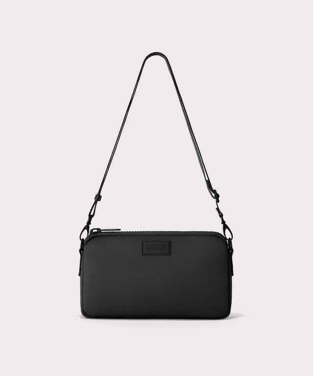 Dagne Dover Nora Shoulder Bag in black, side angle.