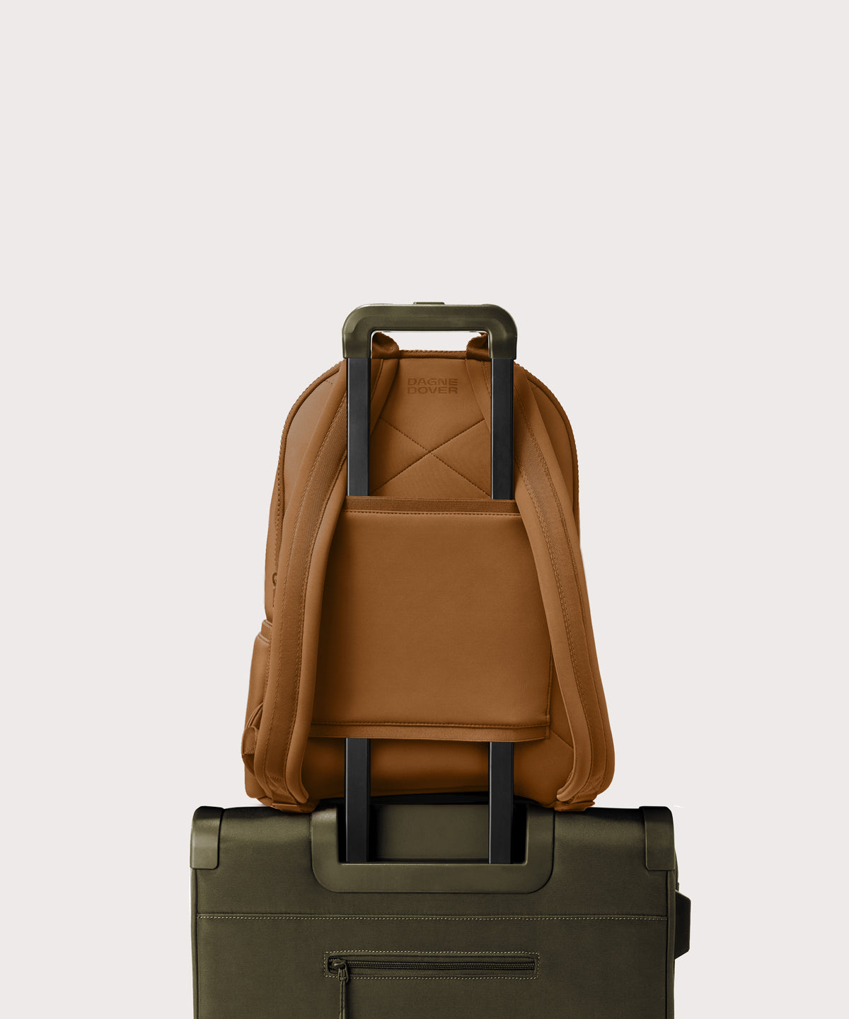Large Dakota in a saturated, warm medium-brown with burnt orange undertones. displaying luggage sleeve
