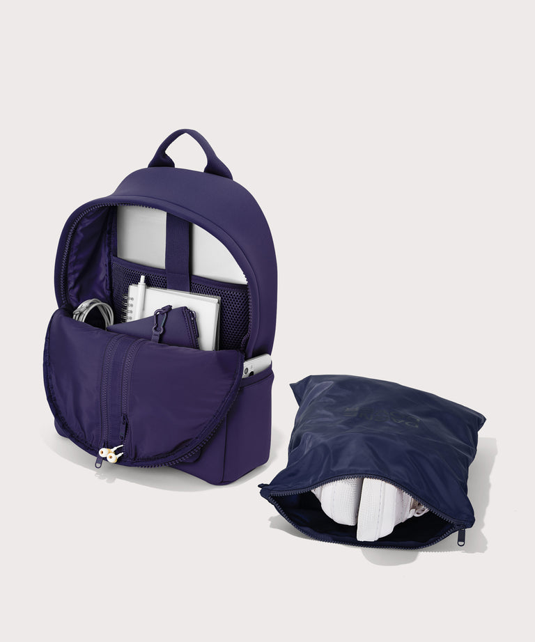 Large Dakota in a jewel-toned, deep blue with strong purple undertones. unzipped, top down view. 
