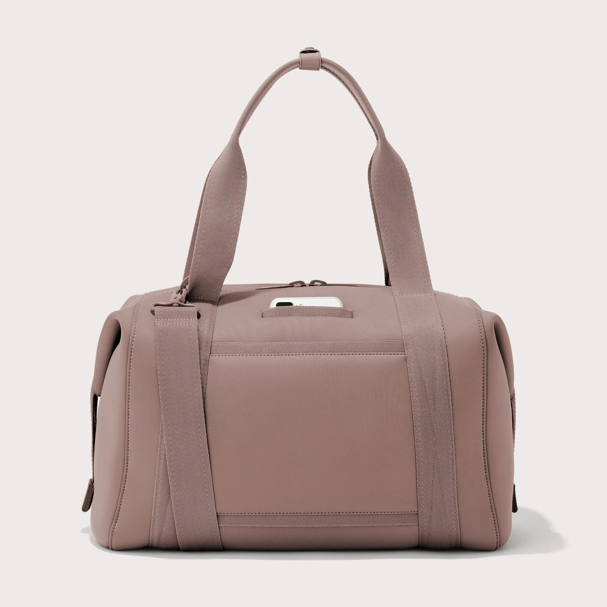 Large Landon Carryall in pink, displaying an exterior phone pocket