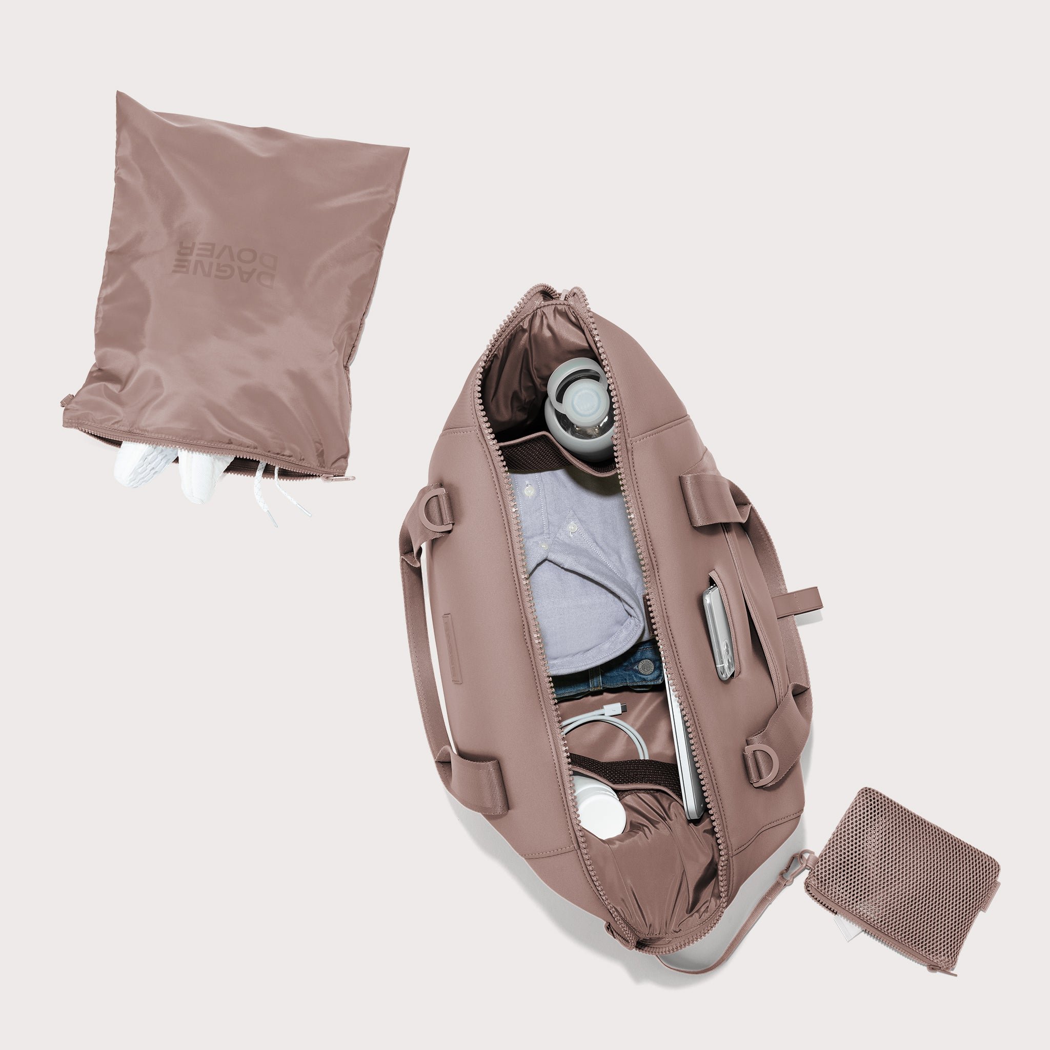 Large Landon Carryall in pink unzipped, top down view. 