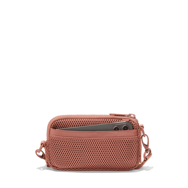 Dagne Dover Mara Phone Sling in warm dust pink air mesh showing the exterior air mesh slip.