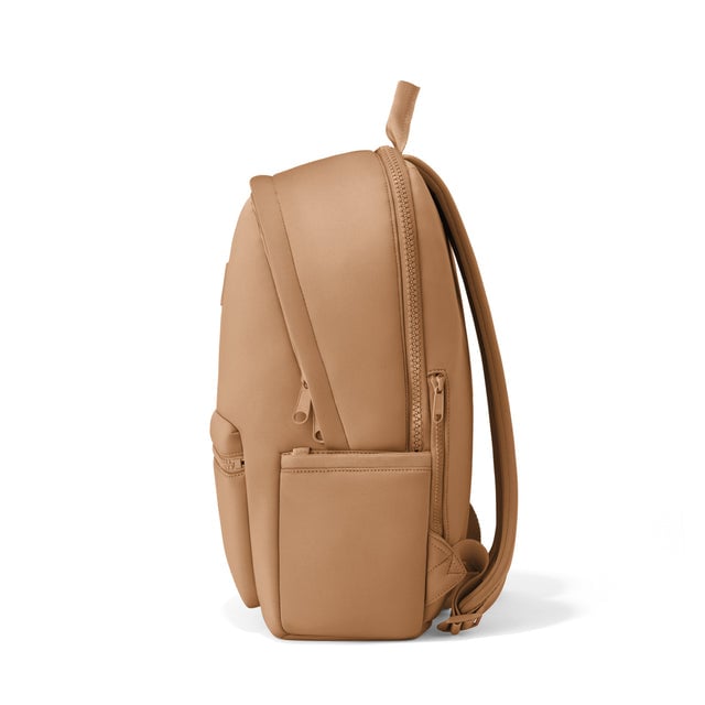 Dagne Dover large Dakota Neoprene Backpack in camel brown seen from the side.