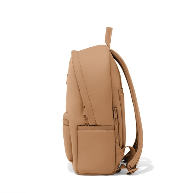 Dagne Dover medium Dakota Neoprene Backpack in camel brown seen from the side.