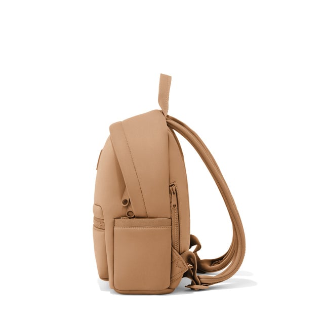 Dagne Dover small Dakota Neoprene Backpack in camel brown seen from the side.