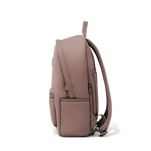 Dagne Dover medium Dakota Neoprene Backpack in pink seen from the side.