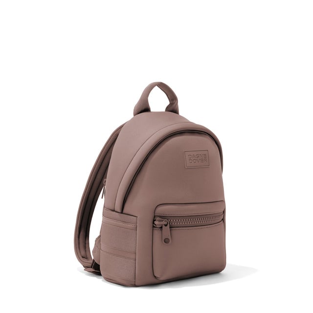 Dagne Dover small Dakota Neoprene Backpack in pink seen from an angle.