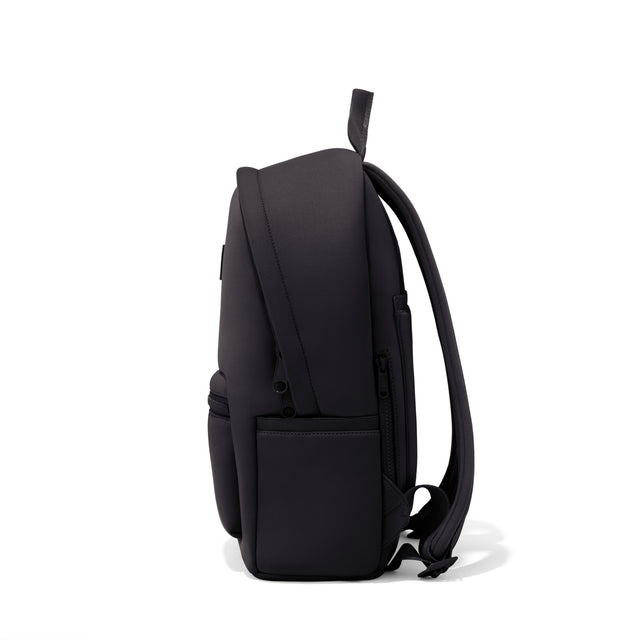 Dagne Dover medium Dakota Neoprene Backpack in black seen from the side.