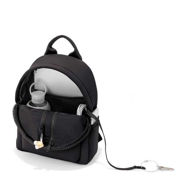 Dagne Dover small Dakota Neoprene Backpack in black unzipped, showing the interior pockets and key leash.