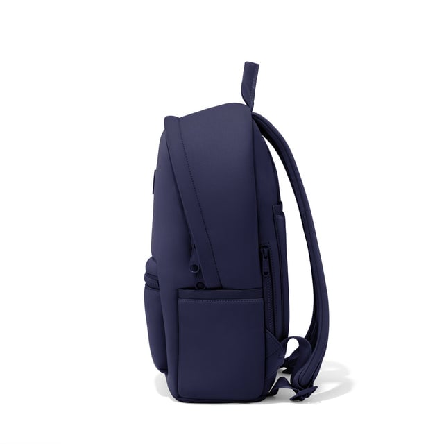 Dagne Dover medium Dakota Neoprene Backpack in dark blue seen from the side.