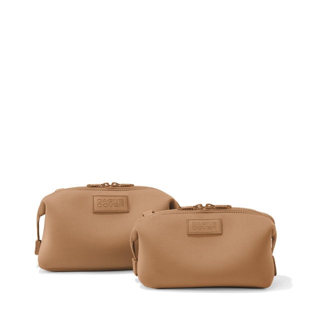 Dagne Dover Small and Large Hunter Toiletry Bags in camel brown.