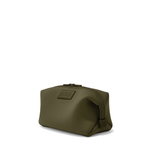 Dagne Dover Large Hunter Toiletry Bag in dark green seen from an angle.