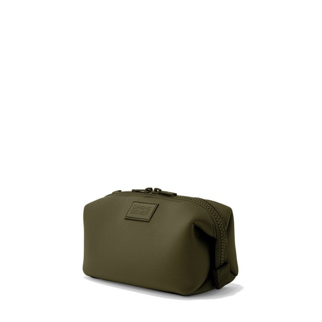 Dagne Dover Small Hunter Toiletry Bag in dark green seen from an angle.
