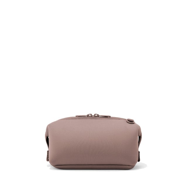Dagne Dover Small Hunter Toiletry Bag in pink seen from the back.