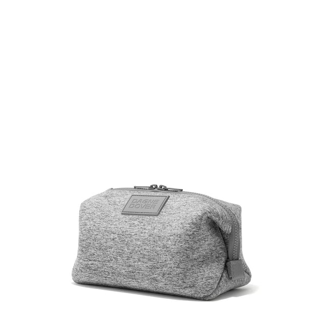 Dagne Dover Large Hunter Toiletry Bag in grey seen from an angle.