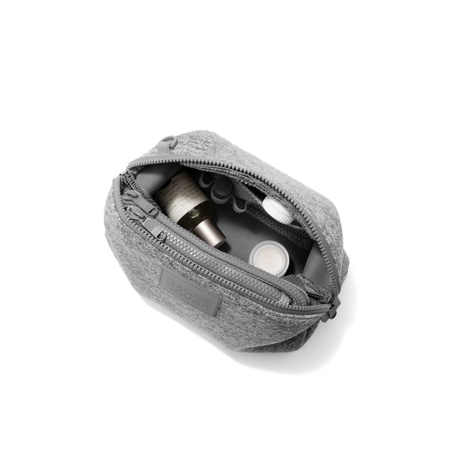 Dagne Dover Large Hunter Toiletry Bag in grey unzipped and seen from above.