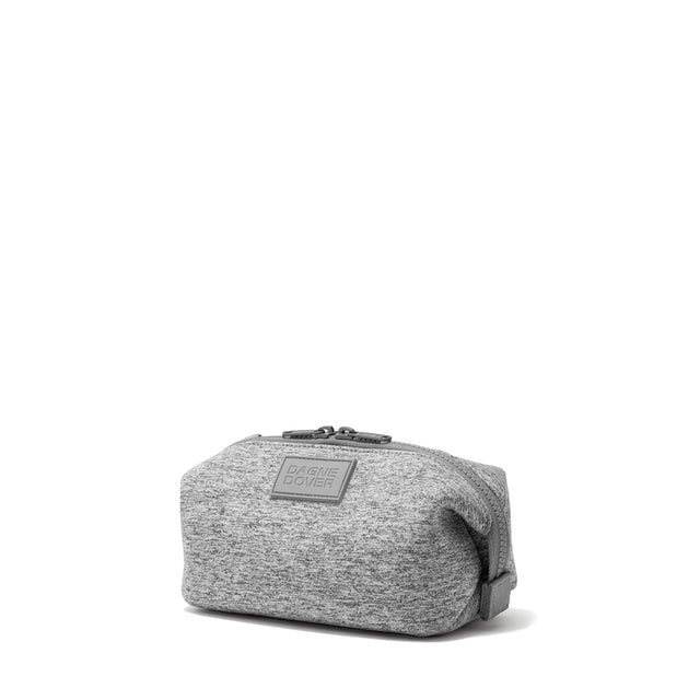 Dagne Dover Small Hunter Toiletry Bag in grey seen from an angle.