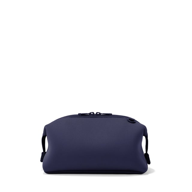 Dagne Dover Large Hunter Toiletry Bag in navy blue seen from the back.