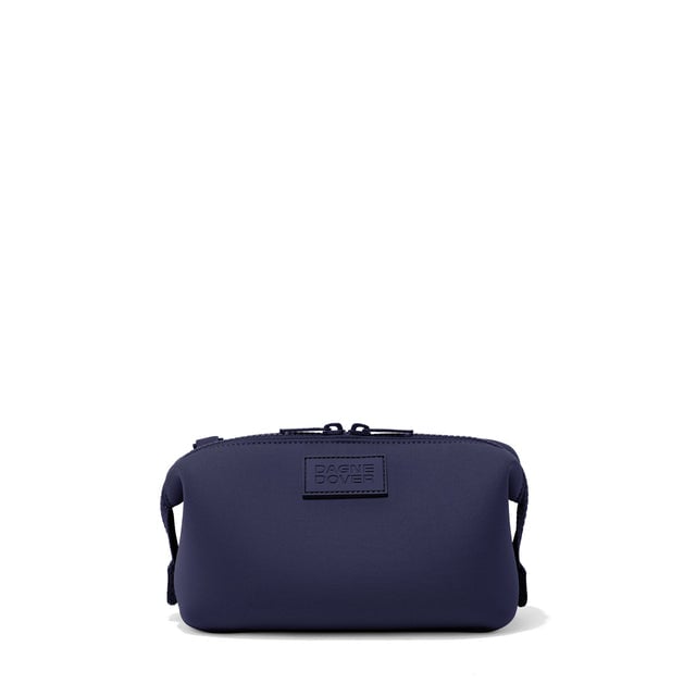 Dagne Dover Small Hunter Toiletry Bag in navy blue.