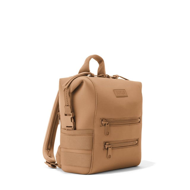 Dagne Dover Small Indi Diaper Backpack in camel brown seen from an angle.