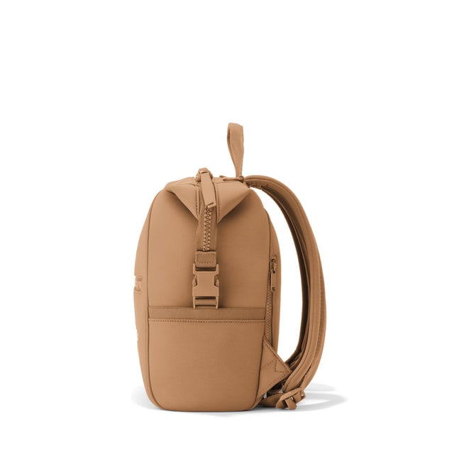 Dagne Dover Small Indi Diaper Backpack in camel brown seen from the side.